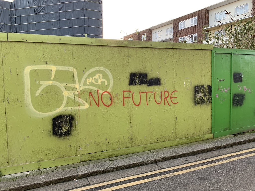 A photo of a wall with “NO FUTURE” written on it. Taken in March 2024 in Dover, the UK. When I visited again a year later, the wall had already been painted over in black.